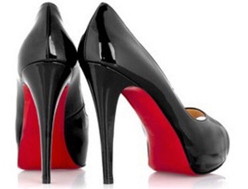 branding louboutin black shoes with red soles.