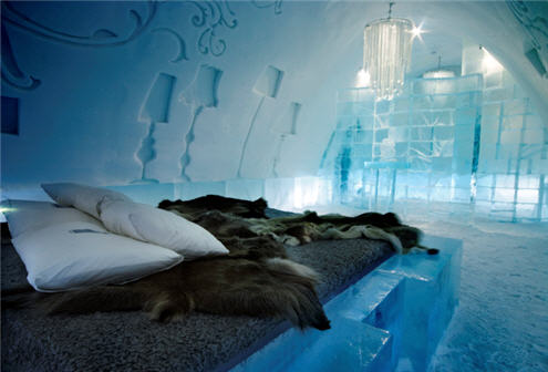 Ice hotel - bedroom with lamp shades. This opens a new browser window.