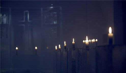 Ice hotel - candles. This opens a new browser window.