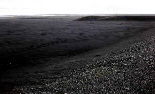 Desert sand - black sand. This opens a new browser window.