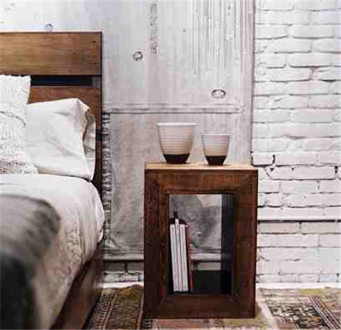 Interiors - wooden block bedside table. This opens a new browser window.