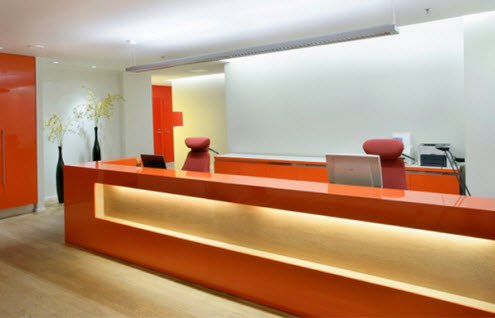 Business interiors – orange – reception. This opens a new browser window.