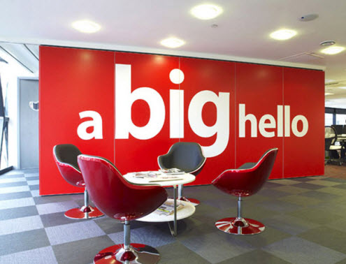 Business Interiors - how to use red to create an impact - Bigmouth Media Ltd reception. This opens a new browser window.