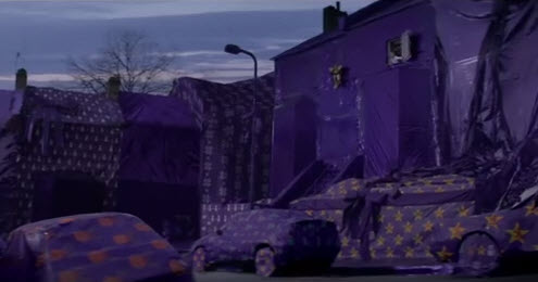 Cadbury's Christmas purple wrapping of Plumstead. This opens a new browser window.