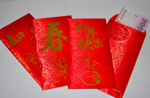 Chinese New Year - the significance of red - red envelopes. This opens a new browser window.